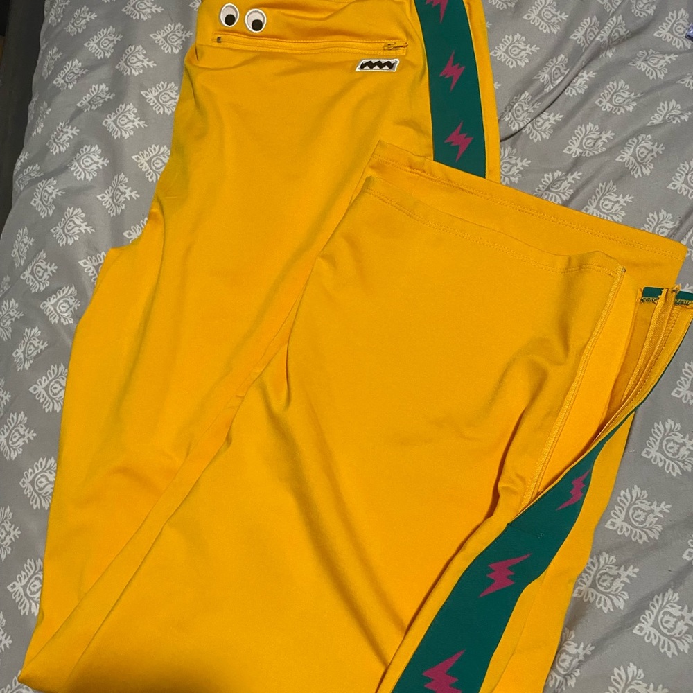 Yellow JBalvin Guess Collection sweatpants.